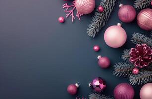 Christmas Ornaments and Pine Branches on Blue Background photo