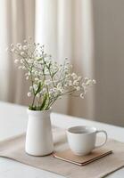 White Flowers and Coffee on Table photo