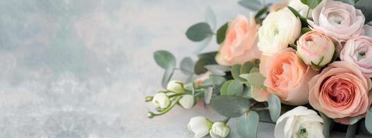 Peach and White Ranunculus Bouquet on Gray Background photo