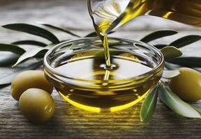 Olive Oil Pouring Into Bowl With Olives photo