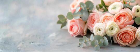 Peach and White Ranunculus Bouquet on Gray Background photo