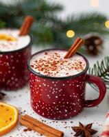 Red Mug of Mulled Wine With Cinnamon Sticks photo