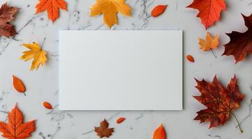 Autumn Leaves Surrounding a Blank Card photo