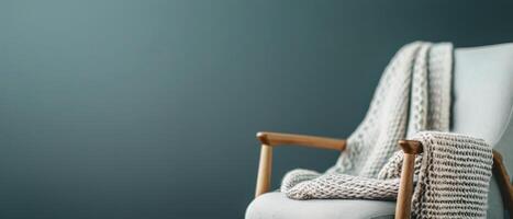 Cozy Chair With Blanket in a Room photo
