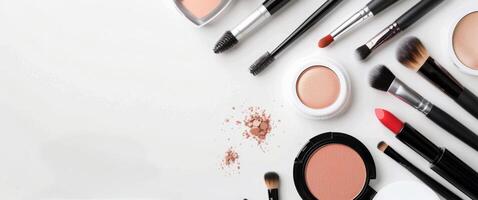 Makeup Brushes and Products on White Background photo