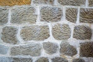 Weathered Dirty Wall made up from Gray Stone photo