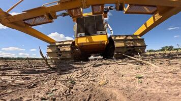 pov crawler tractor passes over the camera video