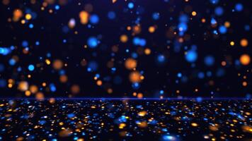 Abstract background of bright glowing sparkle particles of blue and yellow light. seamless loop video