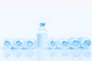 Vaccine bottles lined up on white background with copy space. photo