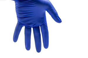 Hand in blue glove isolated on white background with clipping path. photo