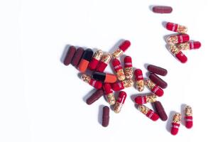 Medicine pills capsules isolated on white background with copy space. photo