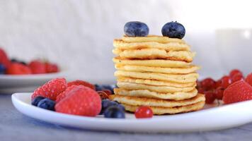 pancakes on a white plate, selective focus photo