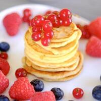 pancakes on a white plate, selective focus photo