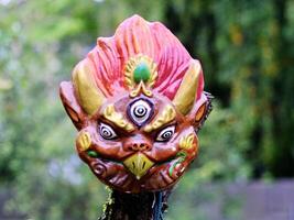 The Mongolian Garuda mask in the form of the head of a mythical bird photo