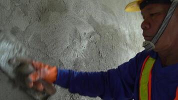 Cement mixing for plastering is a skill of plastering that is accurate and highly skilled. video
