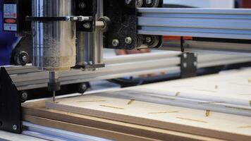 Precision wood cutting with advanced CNC machine for automated craftsmanship in a modern workshop video