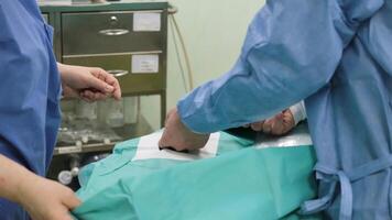A team of surgeons in operating room during procedure. Creative. Medical technologies, concept of sickness. video