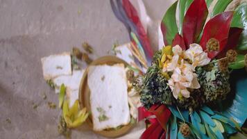 Close up top view of a colorful flower bouquet. Action. Soft and bright flowers and wicker basket. video