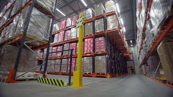 UK, LONDON - December, 2021. Mail warehouse. Creative. A warehouse where people distribute and distribute various large parcels and control the process. video