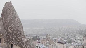 Aerial view of ancient region Cappadocia in Turkey. Action. Beautiful city on a cloudy sky background, concept of tourism and travelling. video
