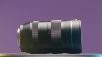 GERMANY, BERLIN - MARCH 21, 2022. Large wide angle lens. ACTION. Showing a new lens on a purple background. Large zoom lens for SLR camera video