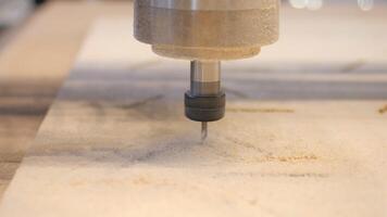 Drilling of wood and metal. Media.Iron new equipment that saws materials at a fast speed at the factory. video