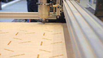 Industrial Wood Carving Machine. Media. Automated machine cutting patterns on wood. Wood cutting on industrial automated machine video