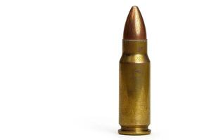 an old brass bullet on white with room for your , photo