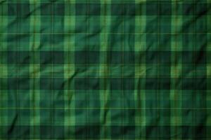 fabric with squares is covered by green and orange, photo