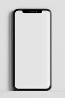 an iphone is lying on its side with a blank screen, photo
