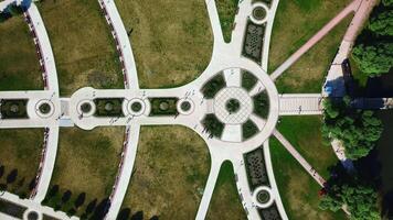 Top view of geometric patterns of old garden. Creative. Beautiful garden with smooth paths and green lawn. Geometric patterns in garden at manor or palace video