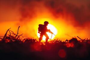 the silhouette image depicts a soldier holding onto a pole and looking at an orange hot fire, photo