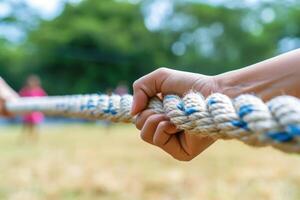 two people holding hands with their ropes, photo