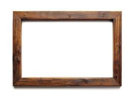 an old wooden picture frame on the wall, photo