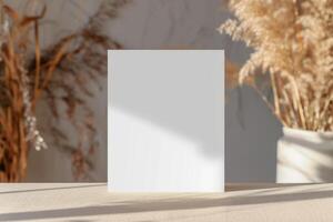 a blank square paper sitting on top of wood, photo