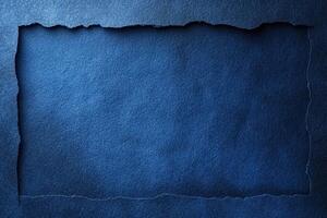 blue paper with an oval hole cut in half, photo