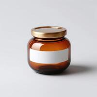 some brown glass with a yellow lid, photo