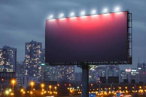 a big billboard in the street at night with city buildings, photo
