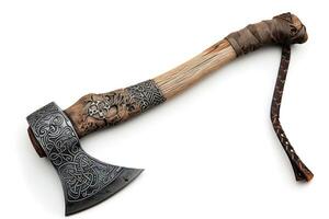 an old worn axe on display with a string cord, photo