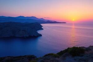the sunrise shines above some mountains in a bay, photo