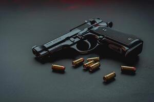 a handgun with bullet shells on a table top, photo