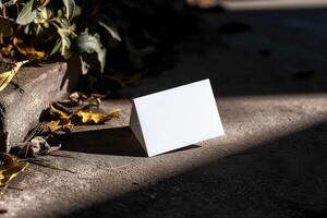 an empty square sign sitting on the side of the street, photo