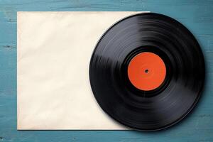 a vinyl record on top of a piece of white paper, photo
