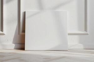 an empty blank canvas sitting on the floor, photo