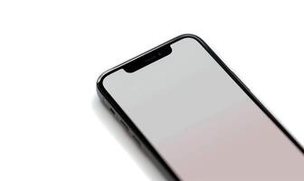 iphone x facing with no screen sitting on a white surface, photo