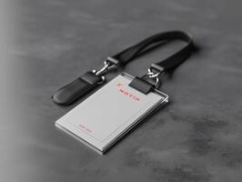 black and white cellphone with a leather strap, photo