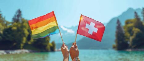 two people holding swiss flag next to sea and mountains, photo