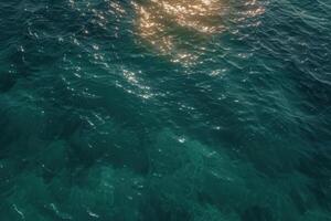 ocean waves gently lapping the sun to their chest, photo
