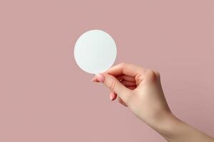 someone holding a paper orb in their hands, photo