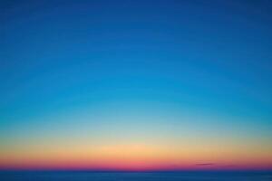 ocean view of an airplane flying over it at dusk, photo